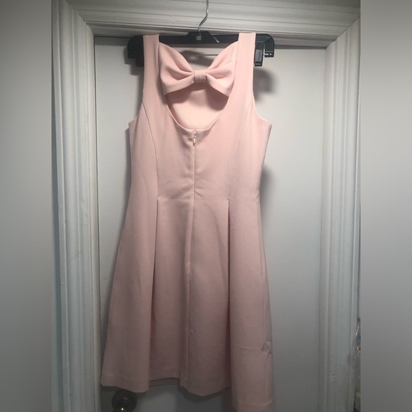 Vince Camuto Dresses & Skirts - Pink sleeveless dress , Vince Camuto , Eye catching bow in back.  Very pretty